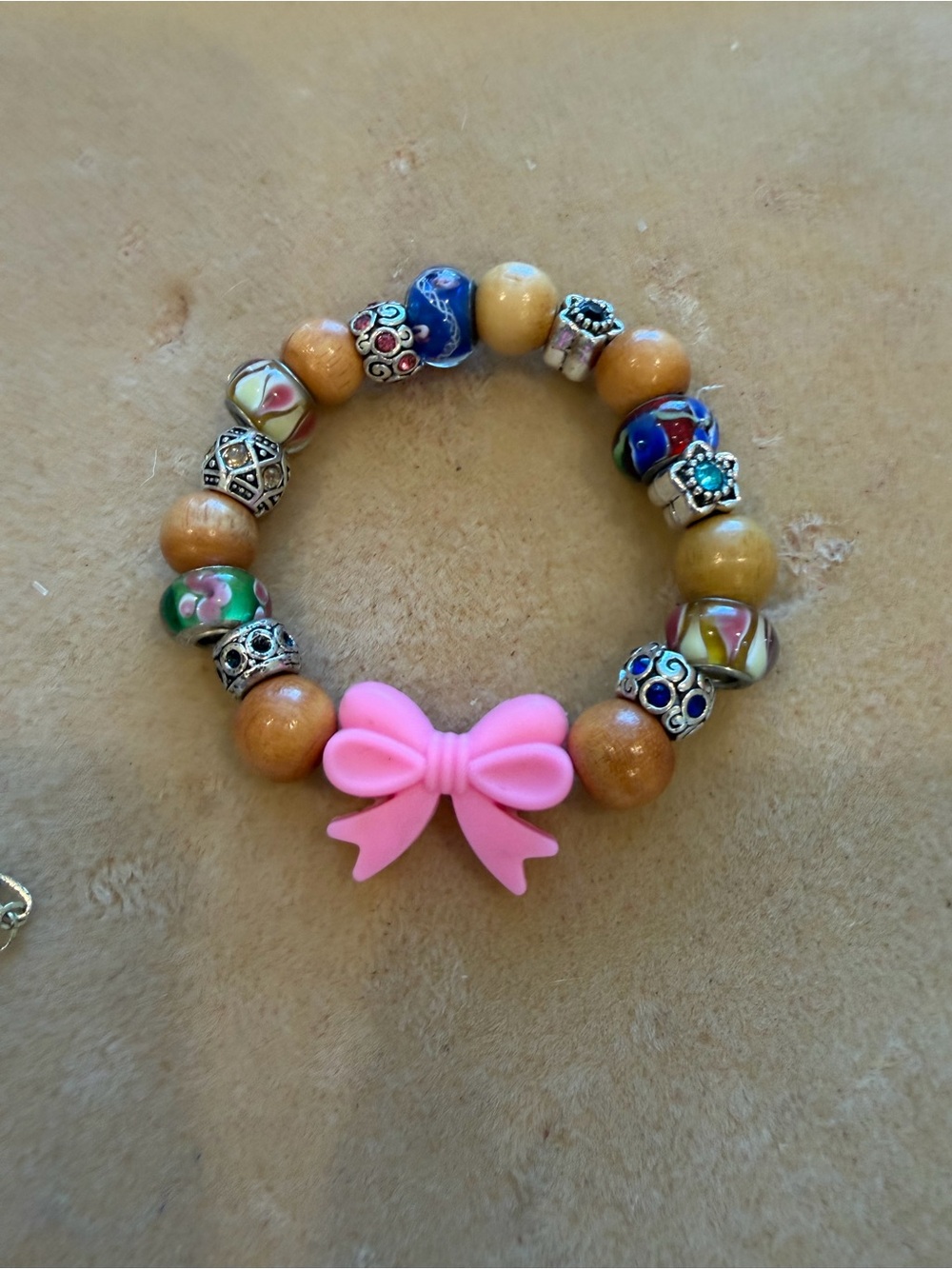 Hand Crafted Pink Bow and Wood-Tone Bead Bracelet